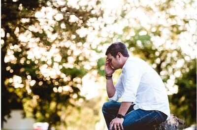 Man sitting and upset about diagnosis