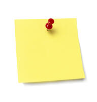 yellow sticky note with red push pin on top